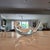 A signed Steuben crystal sea otter sculpture designed by James Archibald Houston, featuring the recognizable reclining...