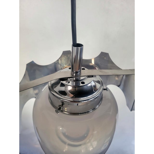 Murano blown glass and chromed steel Space Age style pendant light, Italy, 1970s. Up to 250V (Europe/UK Standard).The...