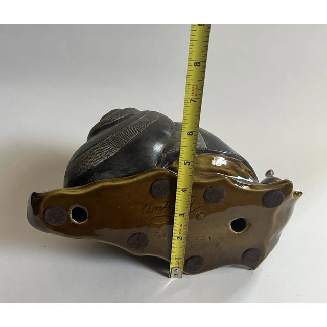 Add a charming piece of classic American pottery to your collection with this **Vintage Anthony Freeman McFarlin...