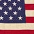This vintage American flag is made from a cotton cloth with fully sewn stars and stripes. Please note staining and other...