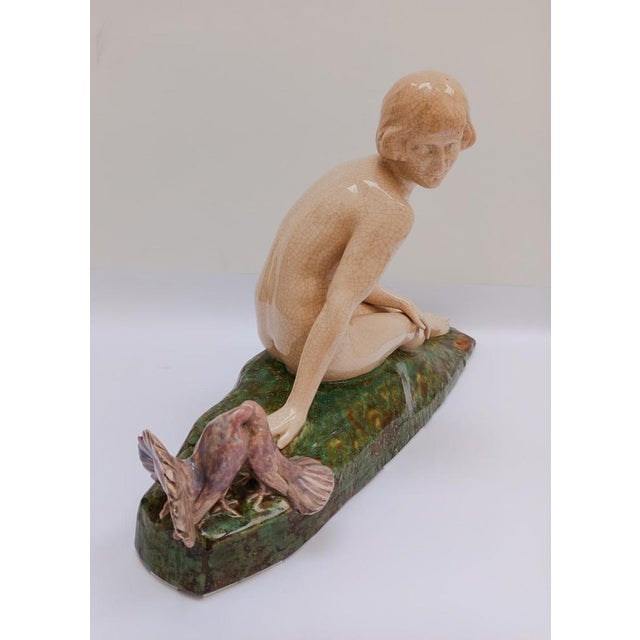 An elegant ceramic sculpture, a typical example of the French Art Deco style of the early 1920s. Created by Alexandre...