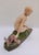 An elegant ceramic sculpture, a typical example of the French Art Deco style of the early 1920s. Created by Alexandre...
