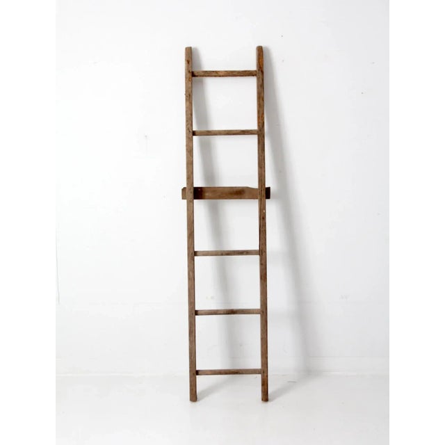 Add a warm, rustic touch to your space with this charming antique wooden picking ladder. The six rungs provide plenty of...