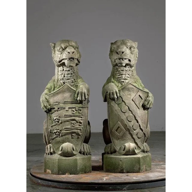 The beasts are portrayed sejant each with the forepaws supporting a shield. They are sitting on octagonal bases. The...