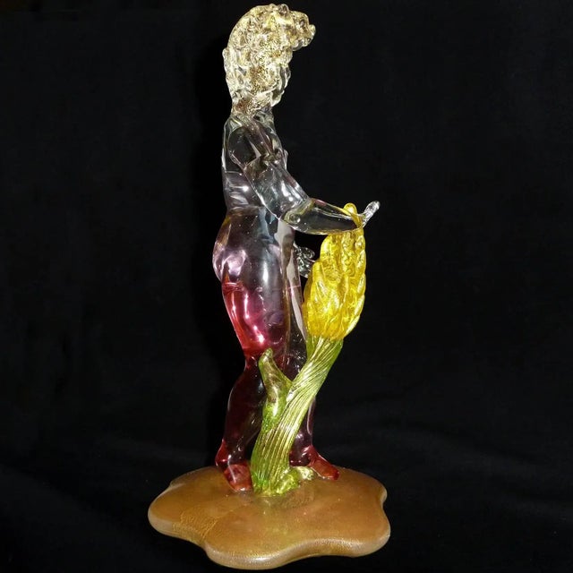 Beautiful vintage Murano hand blown pink Sommerso nude spring garden nymph Italian art glass sculpture. The figure is...