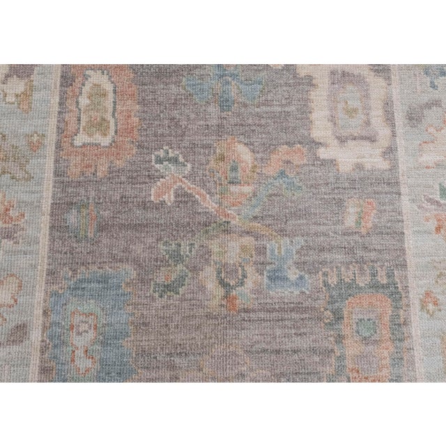 Turkish Oushak Rug Charcoal, Aqua & Coral Hand-Knotted Wool Rug 4' X 6' This vintage Turkish Oushak rug is a beautifully...