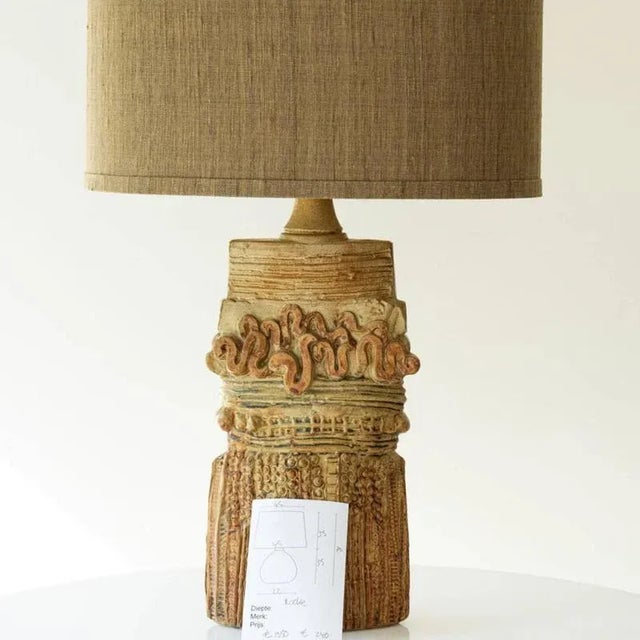 Beautiful Large ceramic table lamp by R Rooke, Uk, 1970s. This lamp base brings refined elegance and rich visual appeal to...