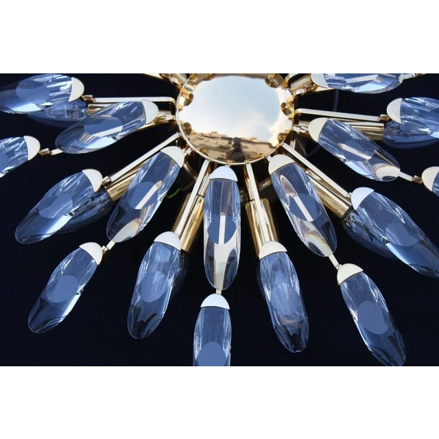 Chandelier in Gold Plating and Crystals by Oscar Torlasco for Stilkronen, 1970s, in Very Good conditions. Designed 1970 to...