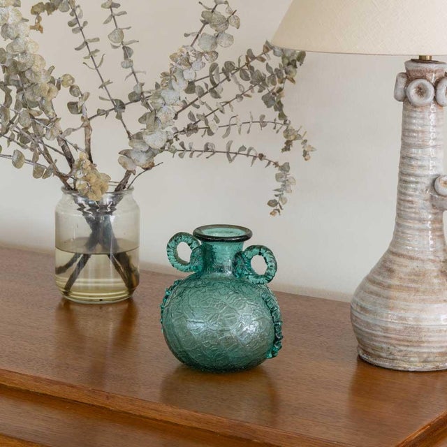 Beautiful glass amphora vase from France, 1960s. Handmade textured green glass with ribbon handle detail. Stunning...