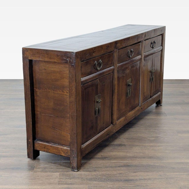 Rustic cabinet with 3 drawers and 3 cabinets, each with an interior shelf. Dimensions (in): 75W x 18D x 35H.