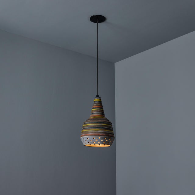 1950s Aldo Londi Ceramic Bitossi Pendant Lamp for Raymor. This rare and sculptural Italian ceramic lamp is executed with...