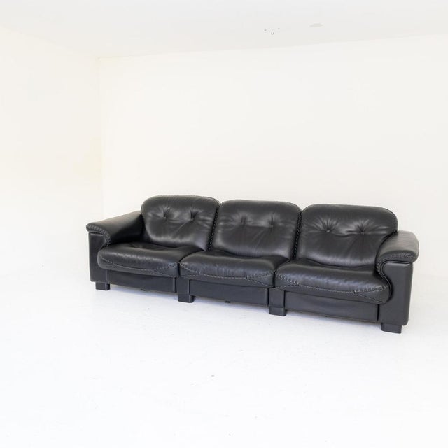 Elegant three-seater sofa model DS-101 manufactured by De Sede, a renowned Swiss company specialising in high-quality...