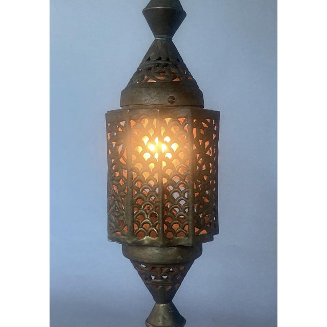 All brass with antique patina, this beauty can be transformed by using a colored light bulb (for those "special" times)....