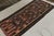 Handwoven in fine wool, a 5x10 vintage Persian kilim originating circa 1950-1960. An intriguing piece from the mid-...