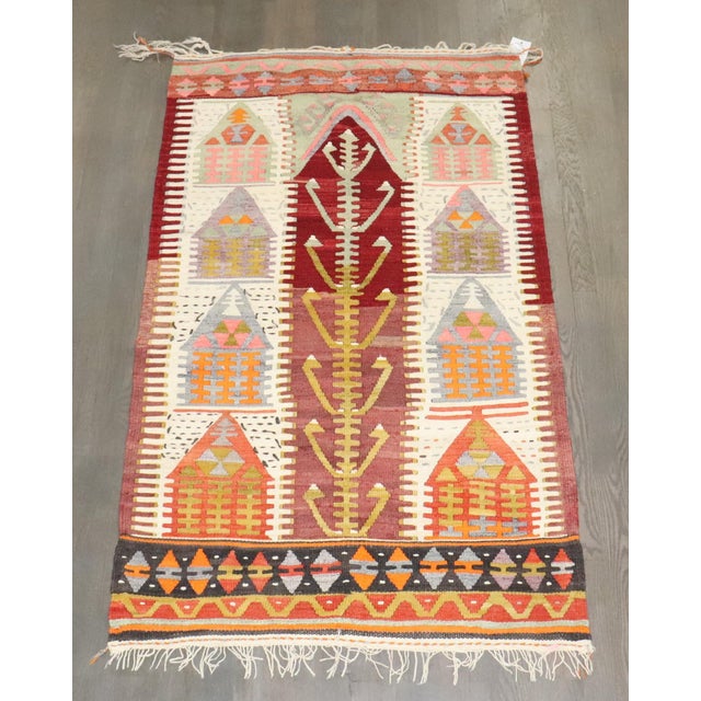 A turkish kilim flatwoven from the middle of the 20th century
