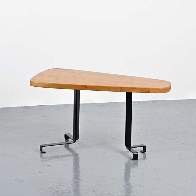 Free-form table designed by Charlotte Perriand. Designed in the 1980s for the Aiguille Grive residence in Les Arcs 1800,...