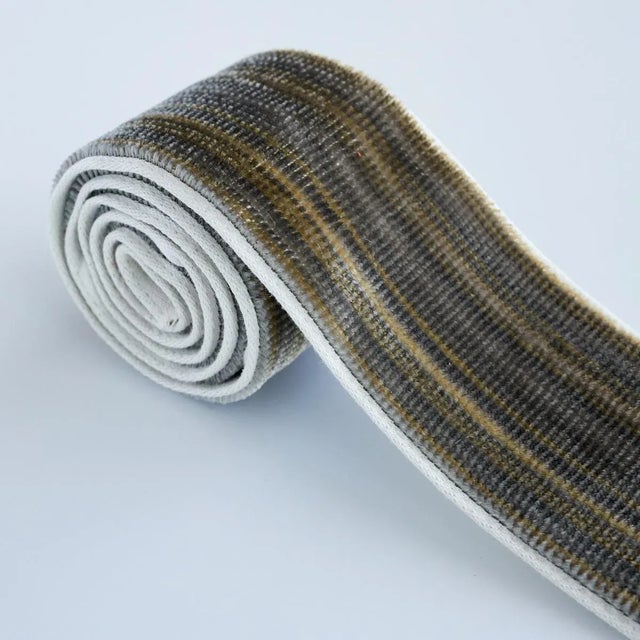 Gaspard Velvet Tape Narrow is a luxurious velvet tape, with its soft and silky pile, irregular tonal stripes and narrow...