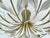 Large mid century pendant light featuring 10 brass curved spokes adorned with white leaves and handpainted gold highlight...