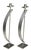 A striking pair of handcrafted sculptural steel candleholders by Rick Martin, each signed and dated 2003 on the underside....