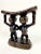 Beautifully carved headrest from the Luba people in central Africa. Couple joining arms and supporting the curved top...