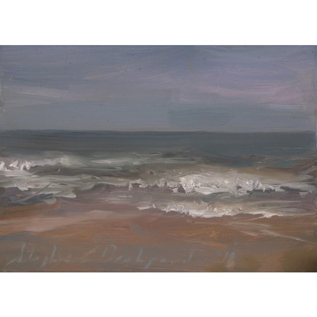 This oil on panel artwork captures a serene coastal scene, where gentle waves meet a tranquil shoreline under a soft,...