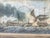 An antique framed maritime battle print depicting two sailing warships engaged in combat at sea. The scene shows cannon...