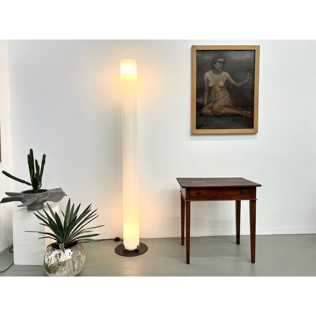 Maison lecan presents this iconic floor lamp from the 80s by achille castiglioni for flos. this is the “stylos” floor...