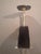 Rare Art Deco side table with magazine rack. Wood painted black and cream white. This piece has an attribution mark, I am...