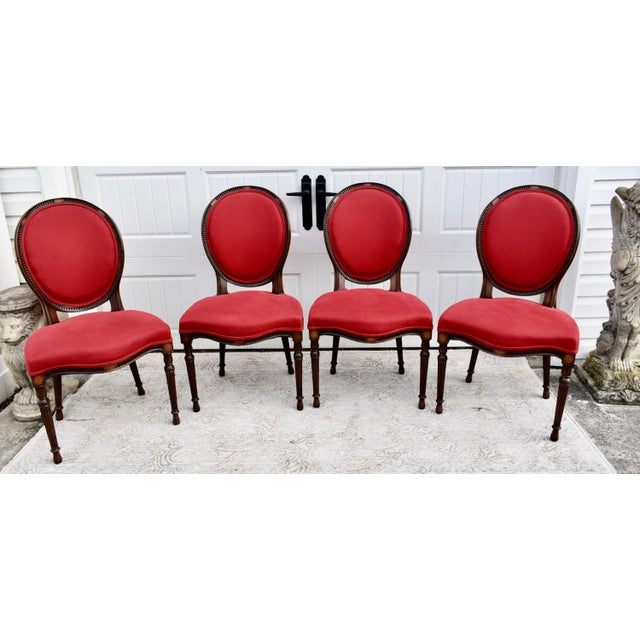 Vintage (1960's) Set of Four DINING Side Chairs have a Regency Style. The Frames are Wood. Walnut. They have a Rounded...