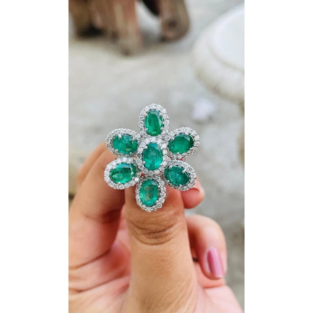 This is part of Chairish’s Fine Jewelry assortment. Emerald flower ring in 14K Gold with diamonds which perfectly goes...