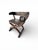 These chairs feature a signature curule X-frame construction with intersecting S-shaped legs. The backs are intricately...