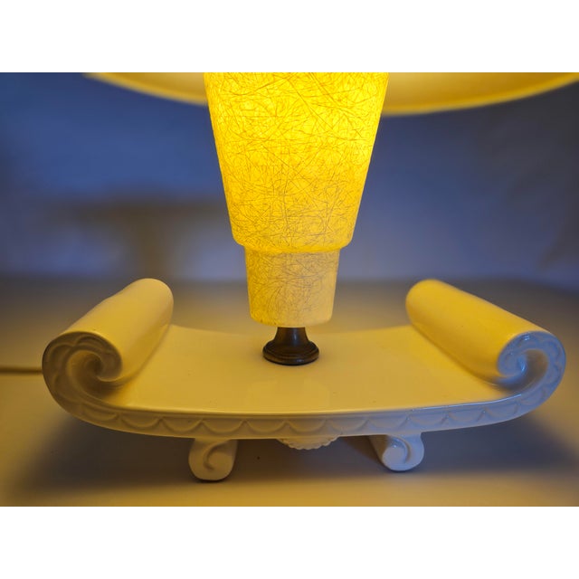 A 50s Modern Ceramic and Fiberglass Far Eastern Styled Table Lamp. A grwat accent lamp with warm light and interesting...