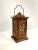 This is a handcrafted wooden lantern with a small drawer underneath. The lattice has paper glued to the side to create an...