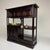 This Japanese cabinet from the 1930s is a beautifully balanced piece, combining practical storage with open display space....