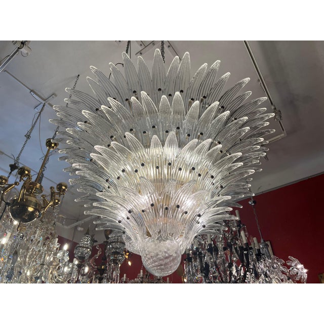 Palmette ceiling lights: Made by 163 Murano trasparent glasses in a gold metal frame. Murano blown glass in a traditional...