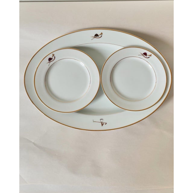 A vintage serving platter and two plates with an equestrian theme. Simple and elegant! Made by the Huntsman.