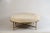 White hide and patinated brass 'Tambour' ottoman by Design Frères. The last picture is of a different version of the...