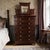 Tall chest with mirror by Kimbel & Cabus, New York, circa 1865–1880. Executed in walnut, this example reflects the firm’s...