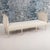 An elegant Gustavian period daybed from the 19th century wearing original paint and newly upholstered in linen. This piece...