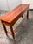 Design Plus Gallery presents a Sofa Table by Impressions for Thomasville Bridges Collection. The sofa table is long and...