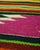Vintage handwoven wool flatweave (kilim) rug with bold striped geometry and diamond medallion motifs in vivid green,...