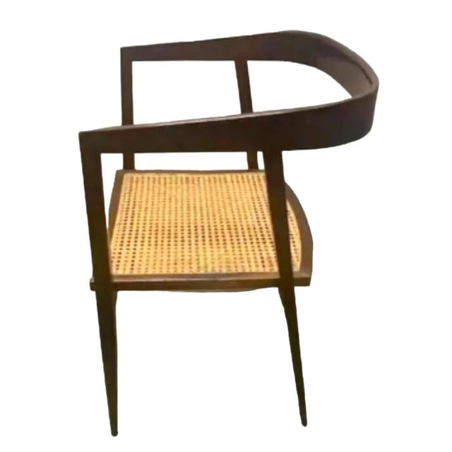 Rare and sought after Joaquim Tenreiro, set of eight armchairs, rosewood, cane, Brazil, circa 1960. One of Tenreiro's most...