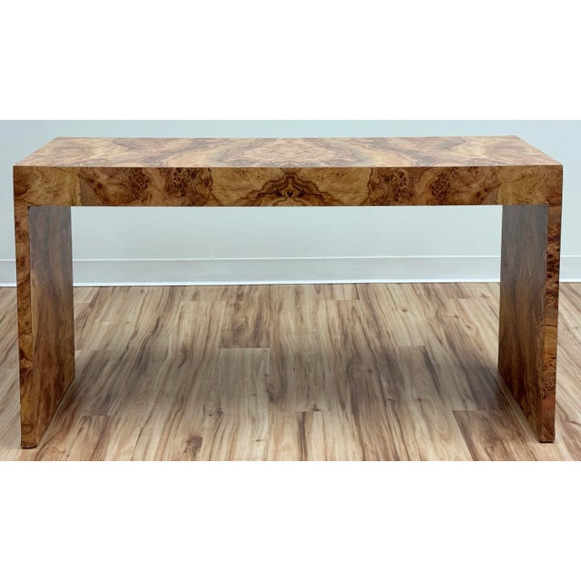 Vintage modern faux burlwood finish formica console table. Rich natural burl look finish with the durability of formica. A...