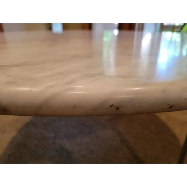 A large round Carrara marble dining table designed by William Katavolos, for Hart-Cobb-Carley of Los Angeles. The table is...
