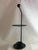 Postmodern black marble and metal umbrella holder by Fly Line, c. 1980s.