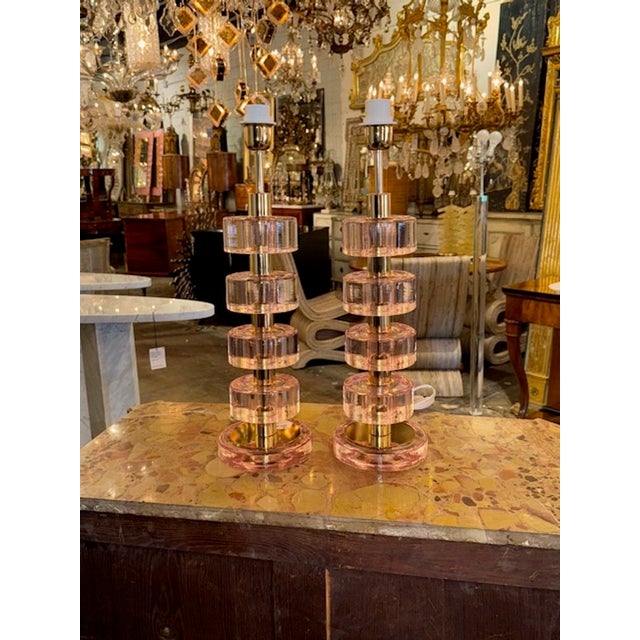 Pair of modern glass and brass disc lamps in pink. Perfect for today's transitional designs! 20H x 6.5W