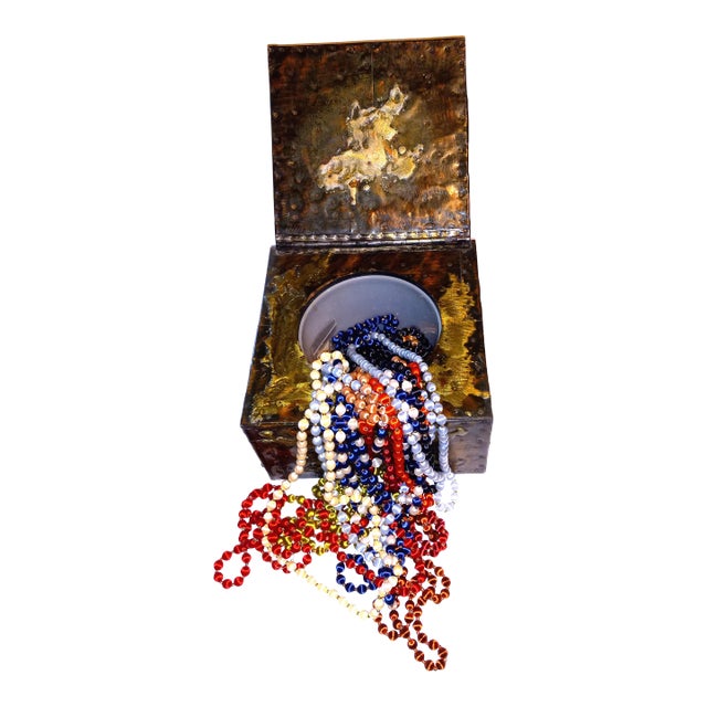 This is a beautiful chest that can be used to hold necklaces as shown or for any other treasure you decide to hide or...