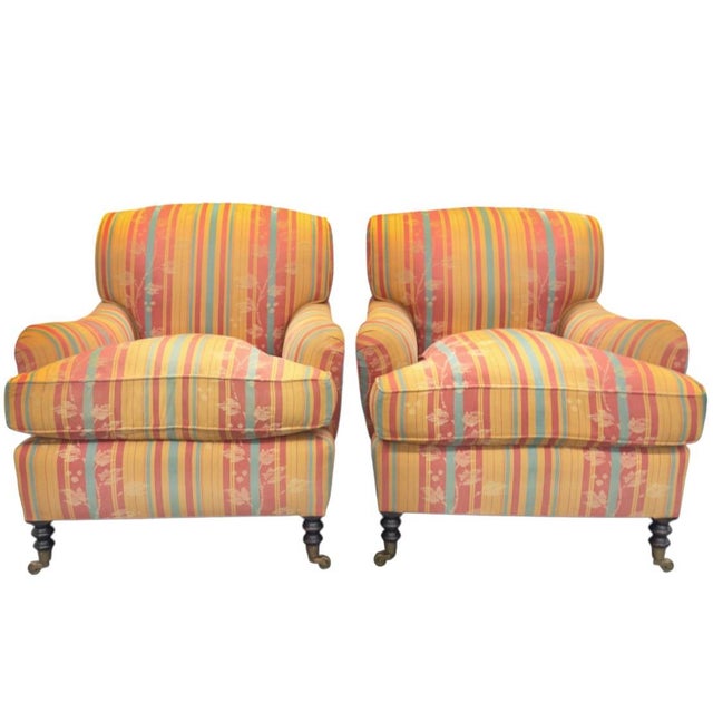George Smith Standard Arm Chairs with down seat cushions on turned legs with antiqued brass casters. There are also two...