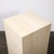 This substantial Mid-Century Rectilinear Travertine Pedestal originated in Italy, circa 1970. Carved from pale ivory-beige...