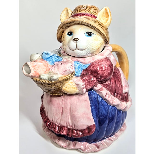 She's straight up fantastic. I have other majolica style teapots- even a bakery style cat- but THIS one? I wanted to call...